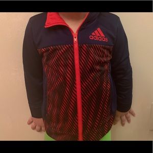 Red and dark blue adidas jacket